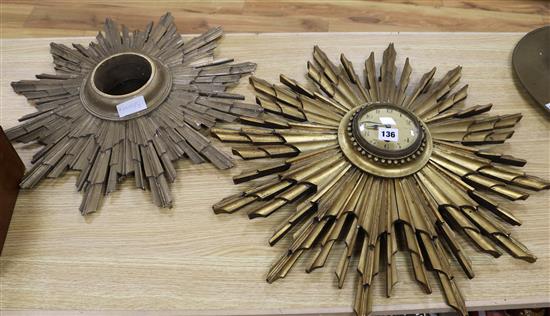 A sunburst clock and a sunburst clock frame